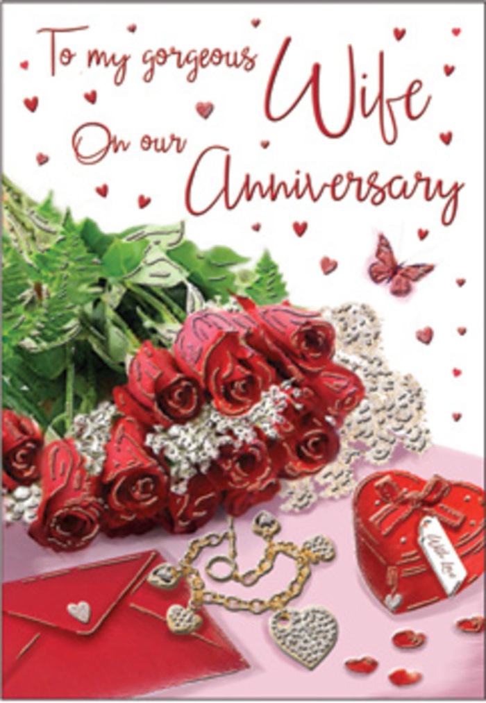 This anniversary card design unfolds like a quiet love story set in Camden, where every element has been arranged with the care of someone who knows how precious each year together can be. At the centre, a cluster of classic red roses commands the eye, their blooms full and luxuriant, petals overlapping in rich crimson layers that seem to glow against the softer background. The roses are paired with lively greenery, leaves in varying shades of green that add depth and movement, as if a fresh bouquet has just been laid down after a stroll through nearby Camden Market. To one side rests a pale envelope, slightly angled, its crisp edges softened by the gentle daylight that bathes the entire scene. Close by, a delicate jewellery piece lies glistening-perhaps intertwined hearts or a fine chain-suggesting a gift quietly exchanged between partners. A heart-shaped keepsake box, glossy and richly coloured, anchors the composition emotionally, its smooth surface reflecting small highlights of light like stored-up memories. Across the scene, tiny hearts, shimmering details, and subtle decorative accents are thoughtfully scattered, creating a sense of celebration without overwhelming the central bouquet. A single butterfly motif adds a touch of whimsy, as if love itself has taken flight. The lighting is soft and diffused, similar to the calm light filtering into a townhouse near Primrose Hill, enhancing the velvety texture of the petals and the shimmer of metal. The entire arrangement feels timeless, intimate, and deeply personal, capturing the warmth of an anniversary shared in Camden.